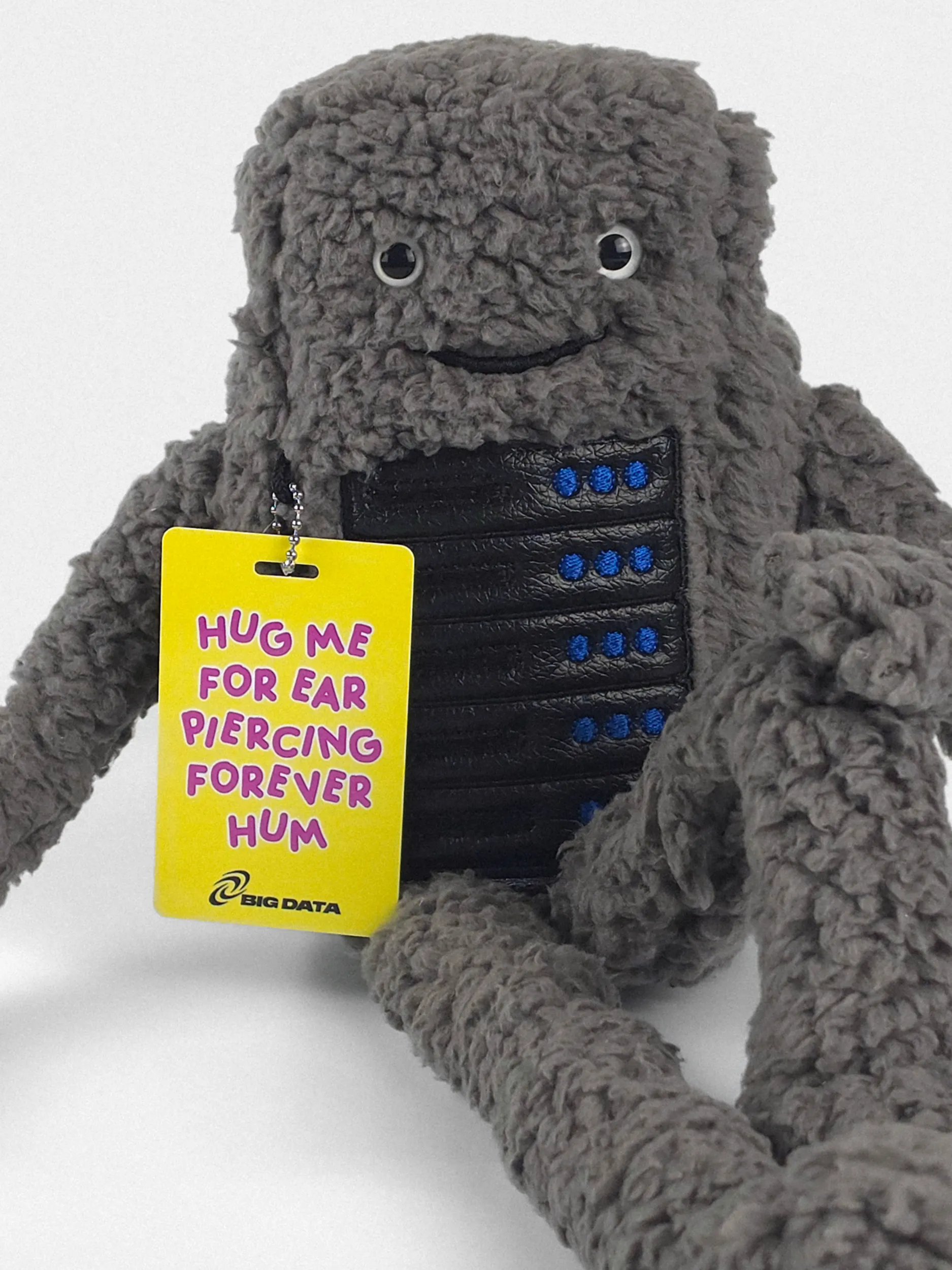 Bezzy plush data center toy leaning on a white background