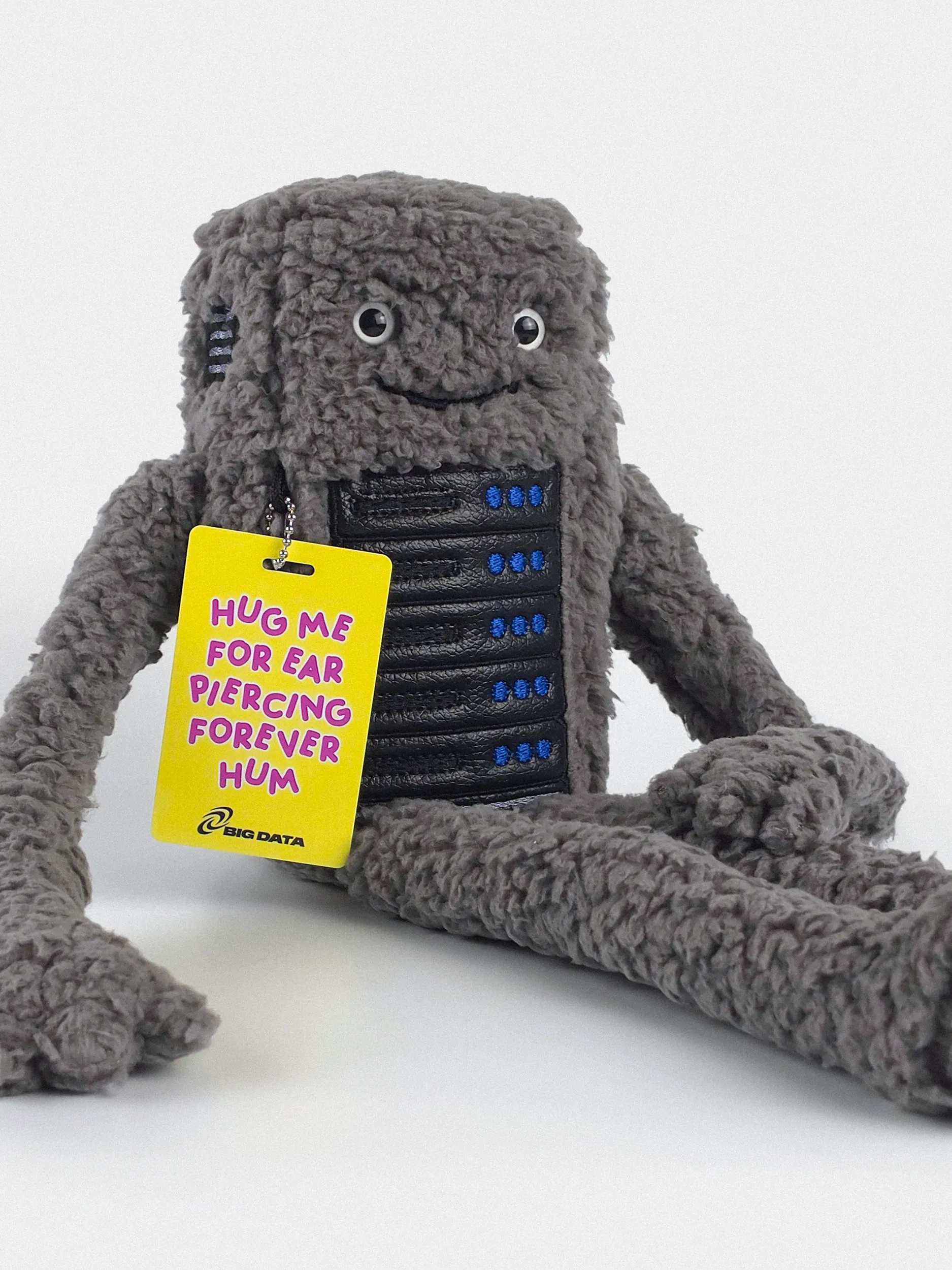 Bezzy plush data center toy sitting on a white background